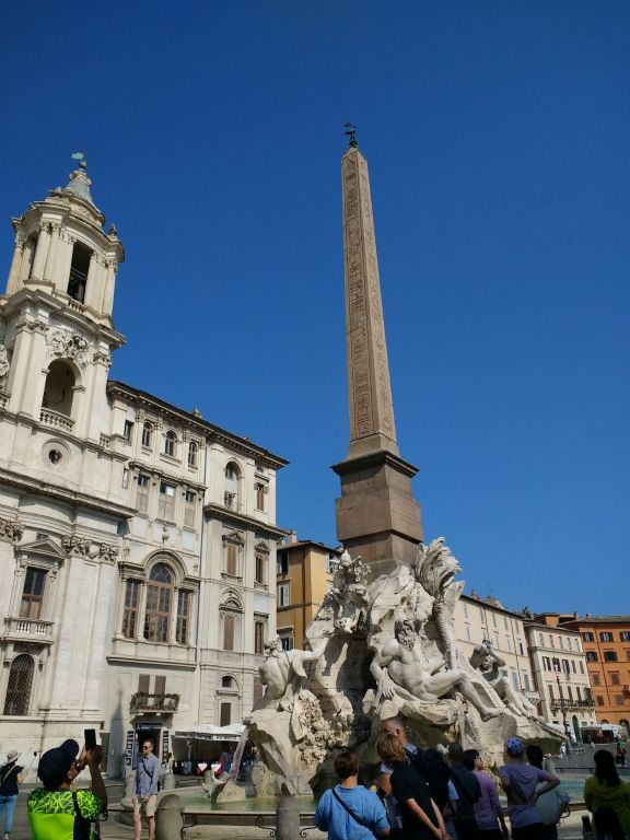 Fountain of the Four Rivers by Bernini with Egyptian obelisk in center of Piazza Navona